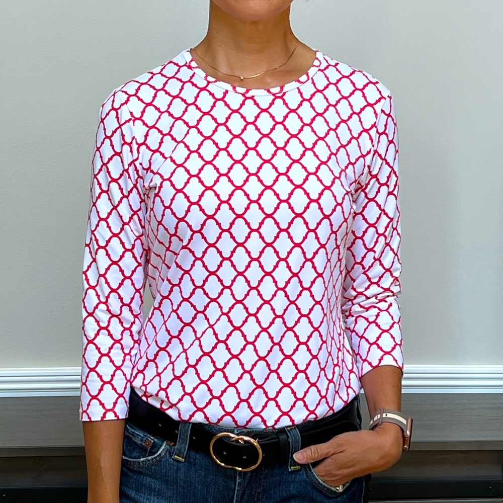 Coral and white patterned blouse